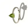 WhatsApp Image 2026-08-07 at 13.00.34 bague or gris 375 péridot / oxydes de zirconium