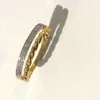 WhatsApp Image 2026-08-08 at 12.22.31 alliance double anneaux or bicolore 375/ oxydes de zirconium
