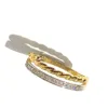 WhatsApp Image 2026-08-08 at 12.22.31 alliance double anneaux or bicolore 375/ oxydes de zirconium